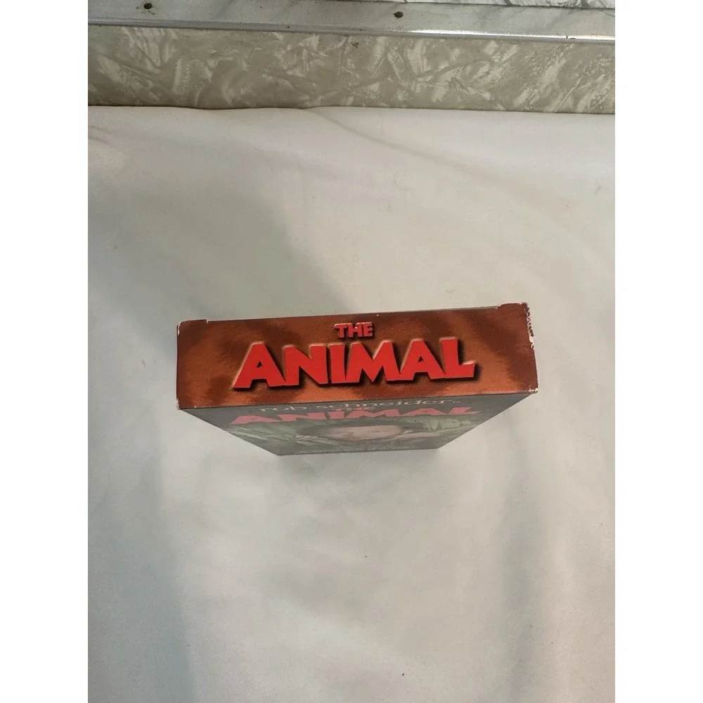 THE ANIMAL ROB SCHNEIDER , EDWARD ASHNER VHS
